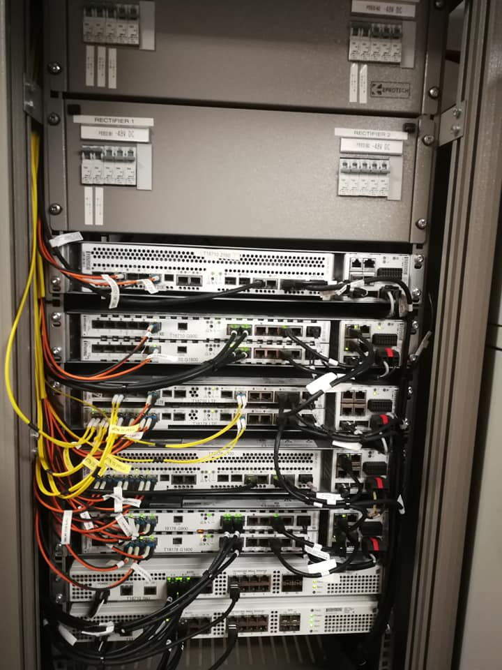 Pridin field technician at a BTS equipment cabinet